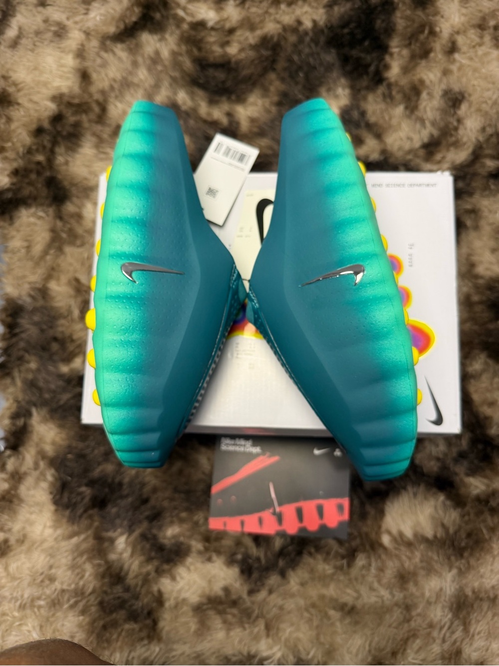 Nike Kids Teal Soccer Cleats with Yellow Studs